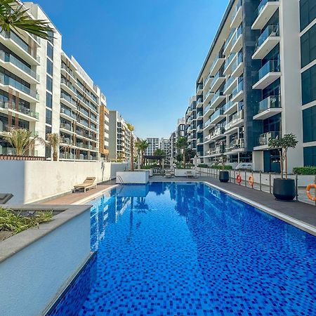 Apartamento Royalton - Serene Studio Apt In The Heart Of Meydan District Dubái Exterior foto